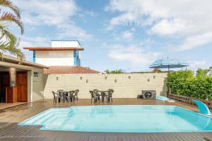 Galería fotográfica de Casa Luz de Verano Piscina Climatizada en Pinheira en Pinheira
