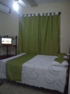 Ένα ή περισσότερα κρεβάτια σε δωμάτιο στο Apartamentos Villa