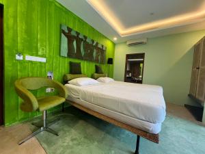 Voodi või voodid majutusasutuse Dickman Resort "The Boutique Hotel" toas