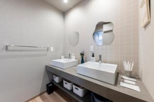 Ένα μπάνιο στο The Comfy Sapporo