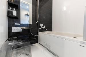 Ένα μπάνιο στο The Comfy Sapporo