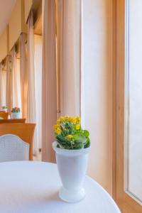 Posteľ alebo postele v izbe v ubytovaní Astura Palace Hotel