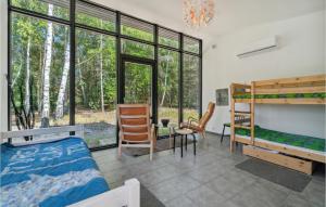 Postel nebo postele na pokoji v ubytování 3 Bedroom Awesome Home In Vig