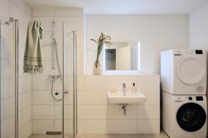 Un baño de Apartment C4 mit Terrasse & Nutzung der Wellness- & Aktivbereiche im "Pine Hill Resort"