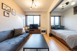 Voodi või voodid majutusasutuse Unison toas