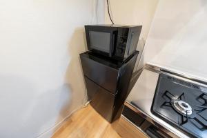 TV a/nebo společenská místnost v ubytování Unify