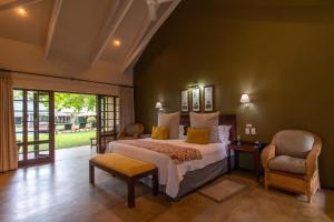 Katil atau katil-katil dalam bilik di Perry's Bridge Hollow Boutique Hotel