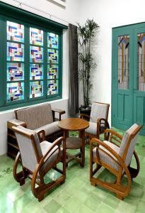 Ein Sitzbereich in der Unterkunft Binumar Guest House