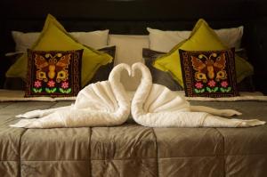 Postel nebo postele na pokoji v ubytování Hotel Inka King