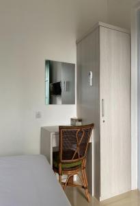 Ein Bett oder Betten in einem Zimmer der Unterkunft Binumar Guest House