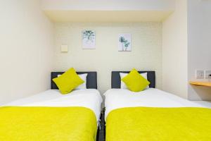 Postel nebo postele na pokoji v ubytování JA Hotel Betencho