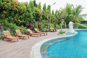 Πισίνα στο ή κοντά στο Thong's Inn Hotel Kualanamu