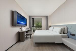 Televisor o centre d'entreteniment de Atour Light Hotel Guangzhou Taikoo Hui Zhengjia Plaza-Free shuttle bus to Canton Fair