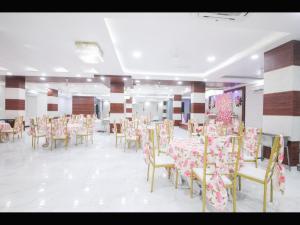 Restoran või mõni muu söögikoht majutusasutuses Kusum House
