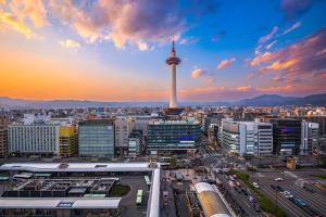 a view of a city with a tv tower at Four Points Flex by Sheraton Kyoto Oike in Kyoto