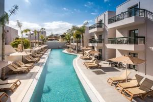 an image of a swimming pool at a resort at Gouves Waterpark Holiday Resort in Gouves