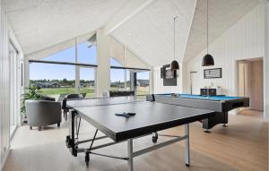 a large room with a ping pong table in it at Gorgeous Home In Nørre Nebel With Sauna in Nørre Nebel