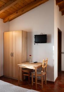 TV a/nebo společenská místnost v ubytování Agri Village Pavia