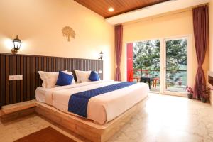 Postel nebo postele na pokoji v ubytování Coastal Grand Resorts - Akshaya + 37 fotografií