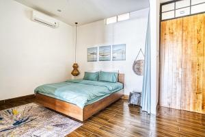 Postel nebo postele na pokoji v ubytování Chaca House