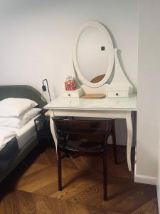 Ένα ή περισσότερα κρεβάτια σε δωμάτιο στο Apartament BonHaus Grzegórzecka