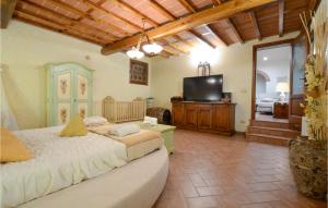 Televízia a/alebo spoločenská miestnosť v ubytovaní Amazing Home In Camaiore