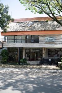 an old building with a sign on the front of it at WABS Syariah in Bandung