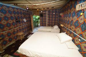Postel nebo postele na pokoji v ubytování Bedouin Lodge Luxor