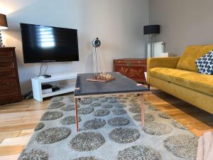 Μια τηλεόραση ή/και κέντρο ψυχαγωγίας στο Petite Villa de impasse du Prieure +2 φωτογραφίες