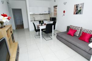 Kuchyň nebo kuchyňský kout v ubytování Apartments Renato