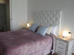 Postel nebo postele na pokoji v ubytování Sandra Rooms