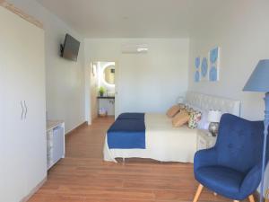 Postel nebo postele na pokoji v ubytování Sandra Rooms