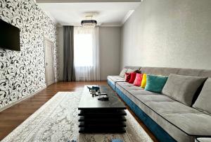 TV a/nebo společenská místnost v ubytování 2-room Retreat Apartments Askia