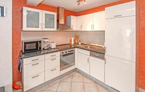 Kuchyň nebo kuchyňský kout v ubytování Ferienhaus Pruchten
