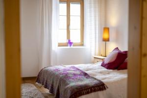 Postel nebo postele na pokoji v ubytování Ferienwohnung Scaletta