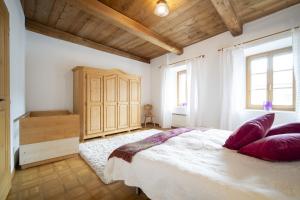 Postel nebo postele na pokoji v ubytování Ferienwohnung Scaletta