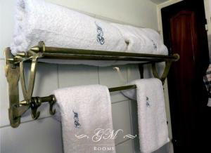 Postel nebo postele na pokoji v ubytování GM Rooms Boutique Hotel