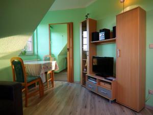 TV a/nebo společenská místnost v ubytování Apartment Stortebeker in Boltenhagen near beach