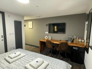 Uno in the City - Luxury Serviced Accommodation客房内的一张或多张床位