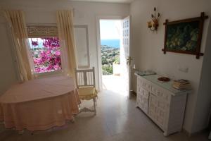 Postel nebo postele na pokoji v ubytování Bellevue - sea view holiday home with private pool in Benissa