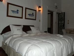 Postel nebo postele na pokoji v ubytování GM Rooms Boutique Hotel