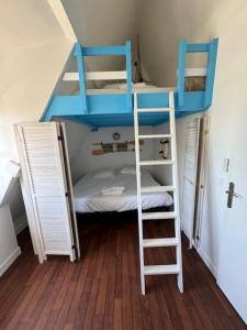 Posteľ alebo postele v izbe v ubytovaní VILLA LA PLAGE