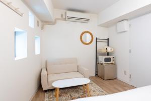 Η κουζίνα ή μικρή κουζίνα στο 東新宿1012