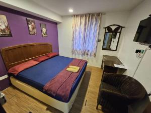 Postel nebo postele na pokoji v ubytování HOTEL Rampai Rooms
