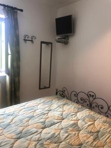 Posteľ alebo postele v izbe v ubytovaní Hotel Bucaneve
