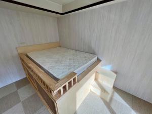 Postel nebo postele na pokoji v ubytování Yuzawa house2