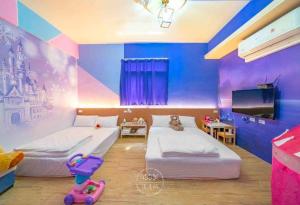 Ένα ή περισσότερα κρεβάτια σε δωμάτιο στο We Smile B&B