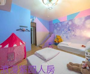 We Smile B&B tesisinde bir odada yatak veya yataklar