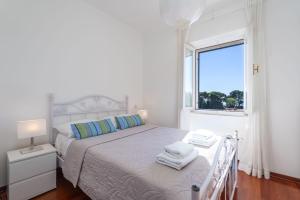 Postel nebo postele na pokoji v ubytování Apartment Alis