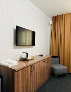 Et tv og/eller underholdning på Рауан